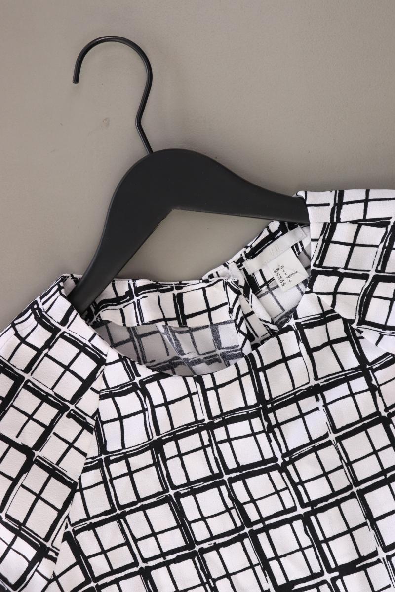 H&M Kurzarmbluse Gr. 34 geometrisches Muster neuwertig weiß aus Polyester