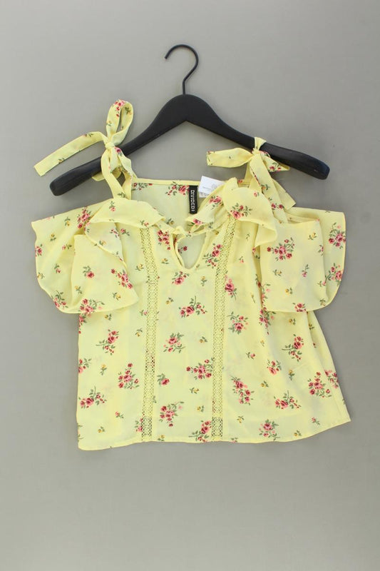 H&M Kurzarmbluse Gr. 34 mit Blumenmuster gelb aus Polyester