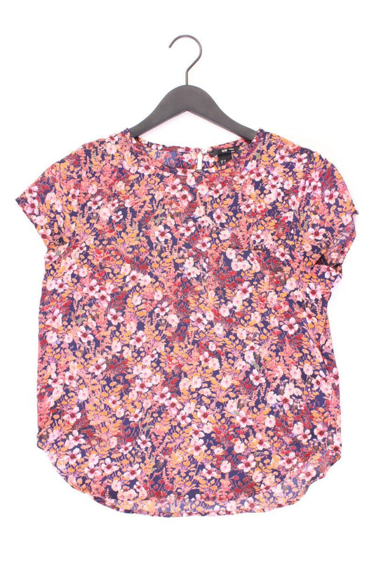 H&M Bluse Gr. 38 mit Blumenmuster Kurzarm pink aus Polyester
