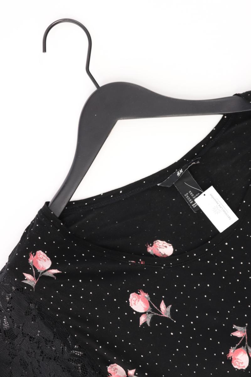 H&M Shirt Gr. XS mit Blumenmuster Kurzarm schwarz aus Viskose