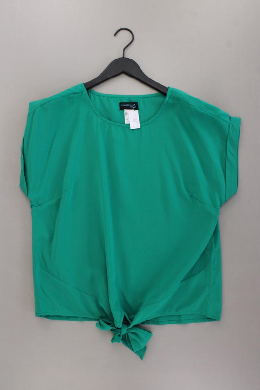 Création L. Bluse Gr. 42 neuwertig Kurzarm grün aus Polyester